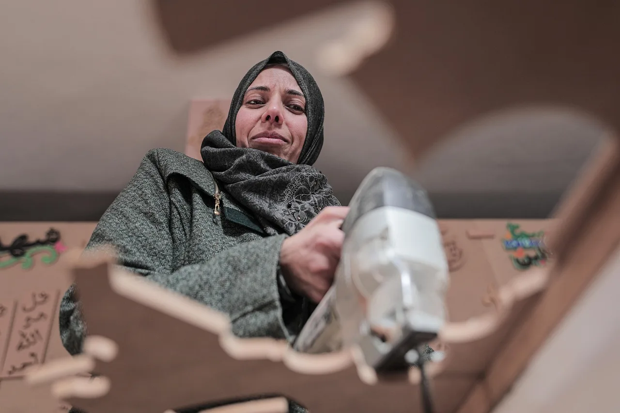 woman, hijab, worker, factory worker, drill, drilling, woodworker, woodworking, tool, machine, workshop, palestine, portrait, hijab, hijab, hijab, hijab, factory worker, drill, woodworking, woodworking, palestine, palestine, palestine, palestine, palestine. 5 things about home workshop makeovers worth your time