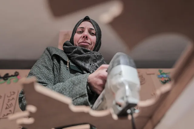 woman, hijab, worker, factory worker, drill, drilling, woodworker, woodworking, tool, machine, workshop, palestine, portrait, hijab, hijab, hijab, hijab, factory worker, drill, woodworking, woodworking, palestine, palestine, palestine, palestine, palestine. 5 things about home workshop makeovers worth your time